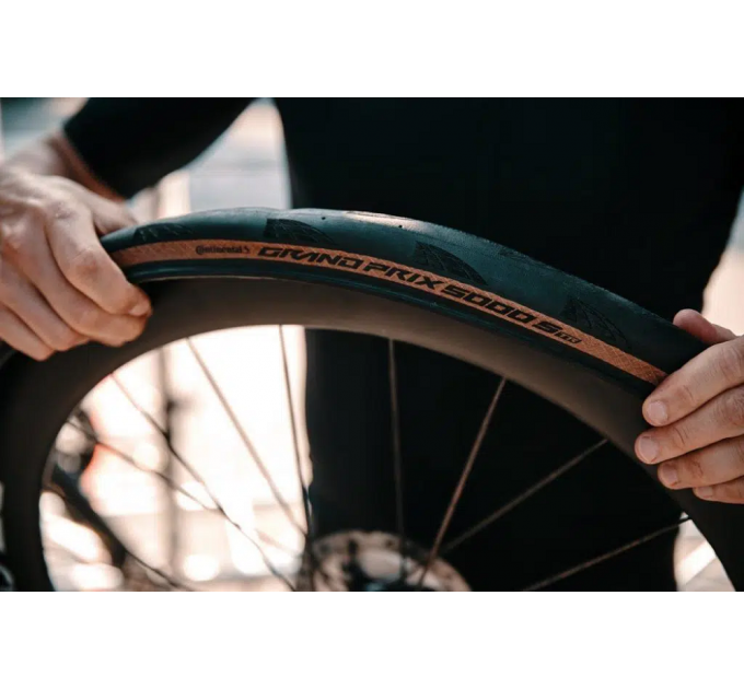 Покрышка бескамерная Continental Grand Prix 5000S TR 28" | 700 x 30C черная/коричневая foldable skin